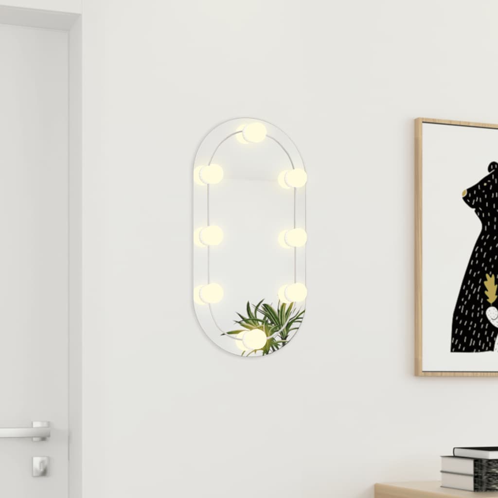 vidaXL Огледало с LED лампи, 60x30 см, стъкло, овално